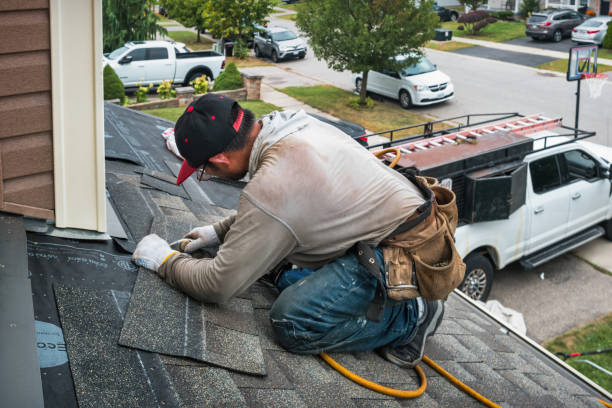 Professional Roof Replacement technician working in Cambridge City, IN